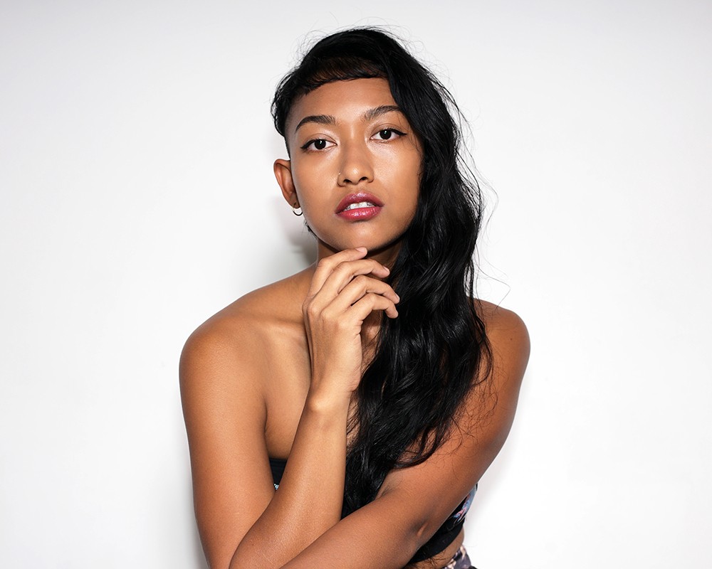 Nadia wears YSL Beauty Rouge Volupté Rock’N Shine in 5 Rocking Coral